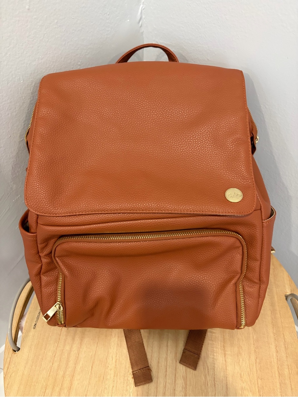 Tan Leather Backpack with Gold Accents - Brand: Unknown